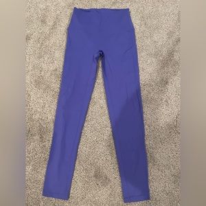 Purple “booty scrunch” leggings. Size medium.